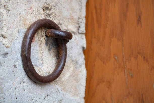 istock Metal ring on the wall 1272584650