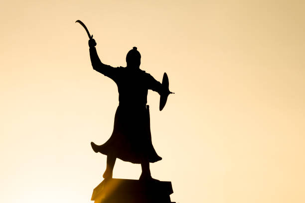 istock silhouette of warrior model with sword and shield in hand 1272585643