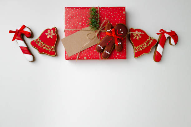 istock Top view of decorated Christmas gift and gingerbread cookie 1272585658