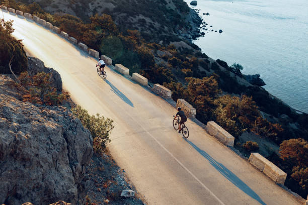 Cyclist riding on his bicycle at coastal road