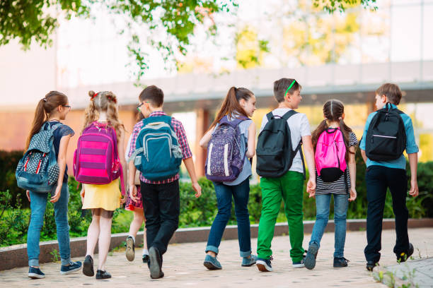 istock Group of kids going to school together. 1272586724