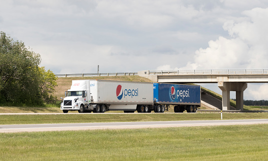 A truck carrying pepsi-cola product south on the Queen Elizabeth II Highway near Edmonton, Alberta. Taken on July 4, 2018