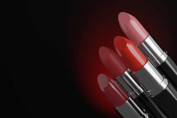 istock Four lipsticks isolated on black background. 3d illustration. 1272591557