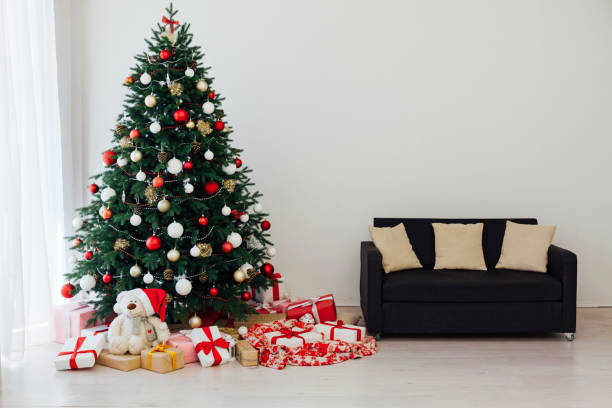 istock Decorated room with beautiful Christmas tree and gifts 1272593849