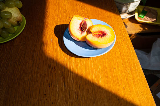 istock fresh peaches on table. Beautiful red yellow peaches. close up 1272594506