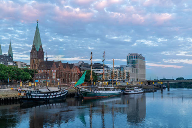 istock Bremen city river side with old building ship boat 1272595843