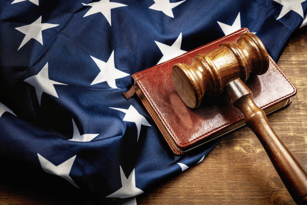 istock Image of wooden judge hammer on notepad 1272599618