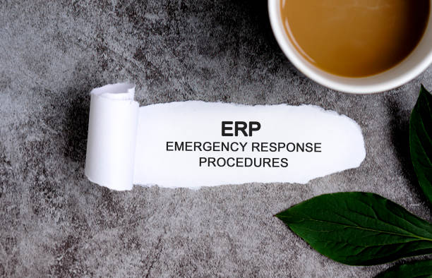 ERP EMERGENCY RESPONSE PROCEDURES with cup of coffee and green leaf ERP EMERGENCY RESPONSE PROCEDURES with cup of coffee and green leaf. emergency response workplace stock pictures, royalty-free photos & images