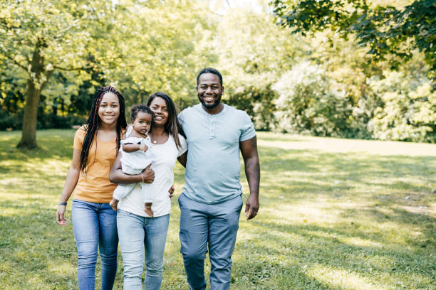 istock Blended family walking in the park 1272603702