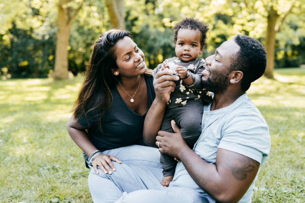 istock Authentic family enjoying time outdoor 1272603713