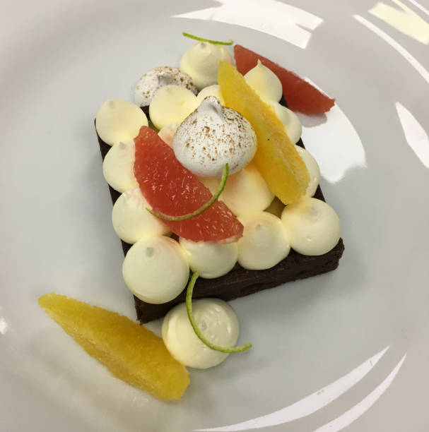 istock Lemon meringue pie with fresh citrus fruits 1272610619