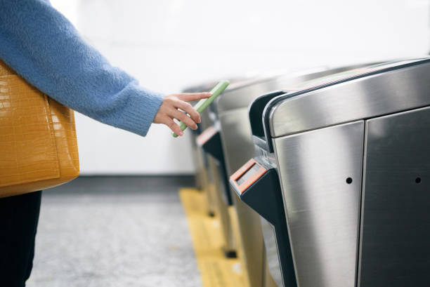 istock Using smart phone to pay at subway station. 1272615184