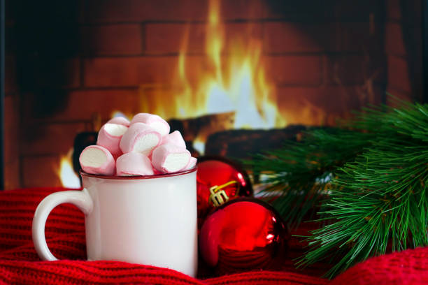 istock Cozy scene with mug near fireplace 1272616192