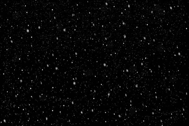istock Falling snow on black background stock illustration 1272619392
