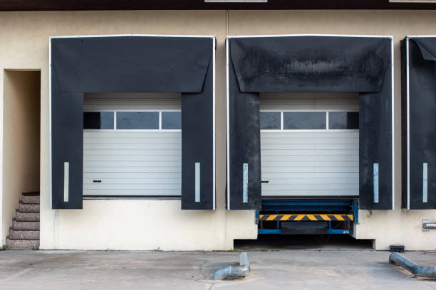 istock Small factory truck loading bay terminals front view daytime 1272625133