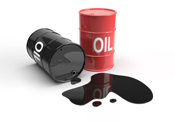 istock Metal barrels with spilling oil 1272625245