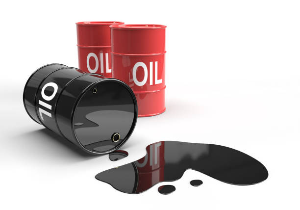 istock Metal barrels with spilling oil 1272625252