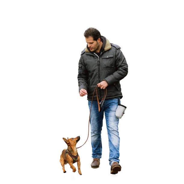 A man and his little dog practicing \