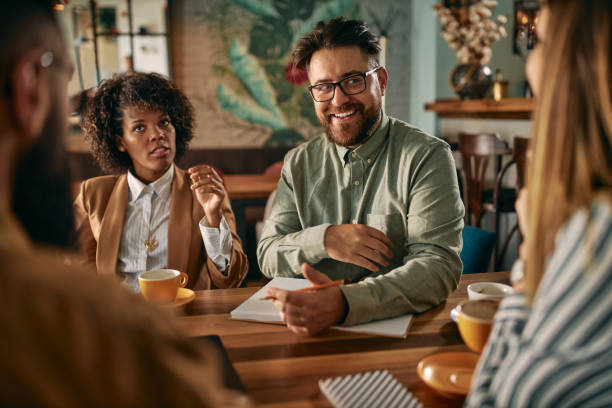 istock Discussing business at the local cafe 1272628119
