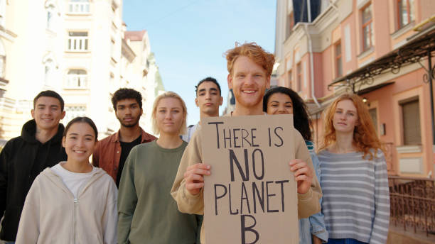 istock Multiracial activists protest supporting ecology and clean planet 1272630719
