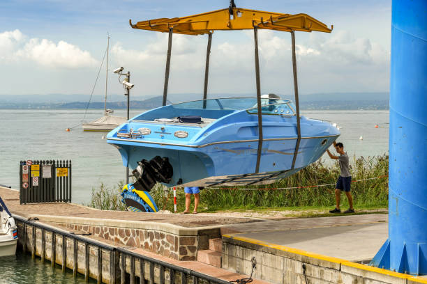 Boat lift along pier at the Tahoe city marina.