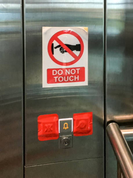 istock Do not touch sign for lift button 1272633057