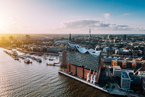 Hamburg, Germany - July 03, 2019: Aerial view on the Elbe river towards Elbphilharmonie at sunset