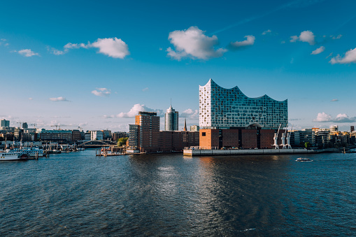 Hamburg, Germany - July 03, 2019: View over the Elbe river towards Elbphilharmonie.