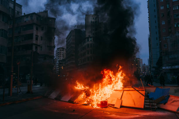 burning street blockade, protesters blocked roads - riot imagens e fotografias de stock