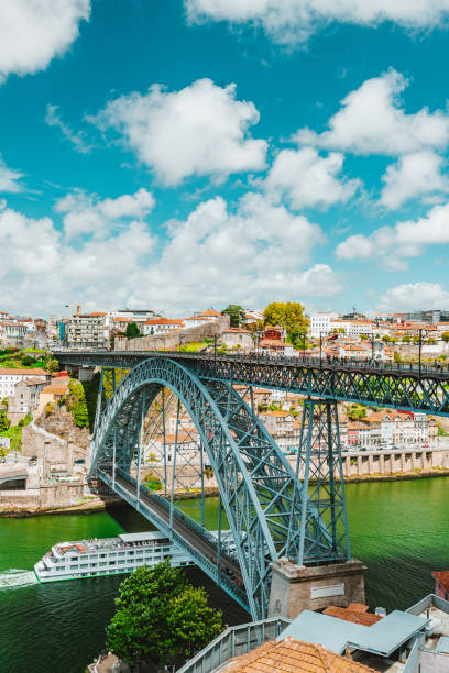 Porto Old Town, Portugal as Viewed from Vila Nova de Gaia with the Douro River Beautiful Porto and the Douro River as viewed from the Ponte Dom Luís I between Gaia and Porto and the Mosteiro da Serra do Pilar vila nova de gaia stock pictures, royalty-free photos & images