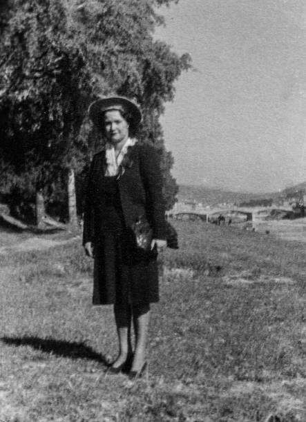 istock Elegant dressed lady having fun visiting Florence in the 1930s. Italy. 1272635659