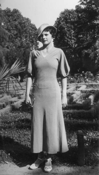 Elegant dressed  lady having fun visiting Rome in the 1930s. Italy.