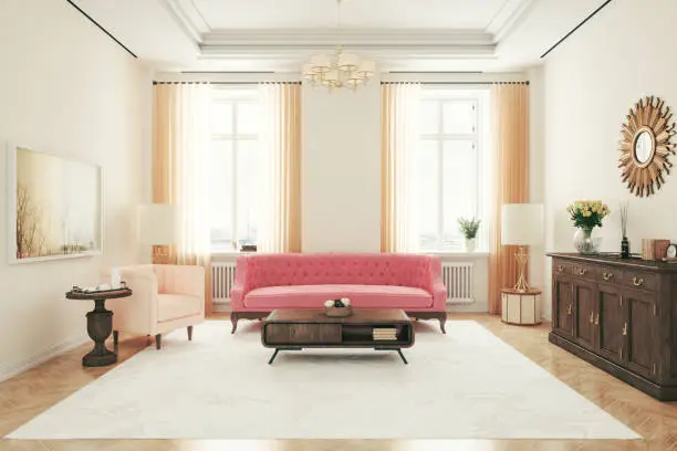 Art deco style living room with pink sofa and armchair.