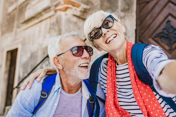 istock Senior couple on a city break taking a selfie 1272641470