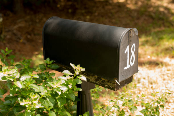 istock Closed mailbox beside a rural road. 1272648117