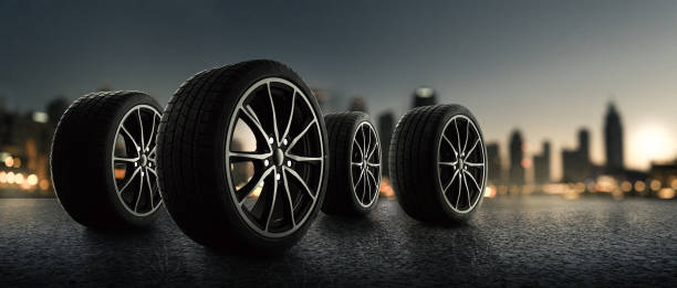 istock Car tires on a street at night 1272648148