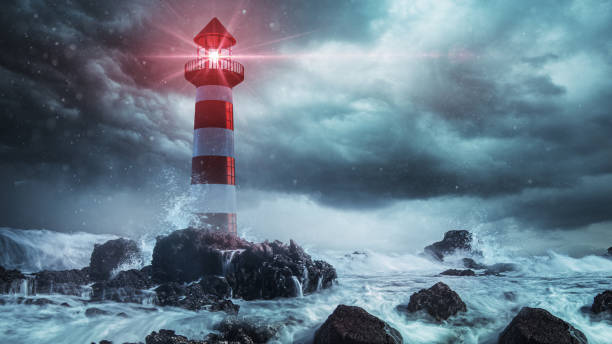 Lighthouse in the storm stock photo