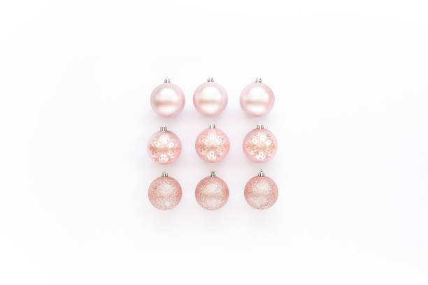 istock Christmas decoration: pink glass christmas balls on white background. flat lay, top view 1272648778