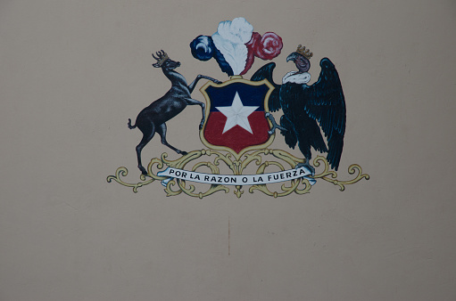 Coat of the armed forces of Chile. painted on the wall of the Arms and Historical Museum. Morro de Arica. Arica y Parinacota region. Chile.