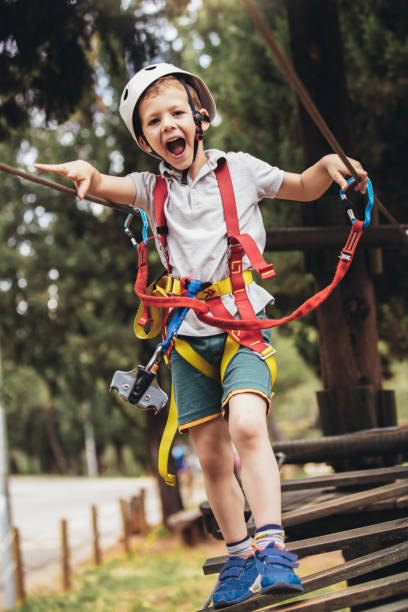 istock Brave little boy having fun at adventure park 1272652642