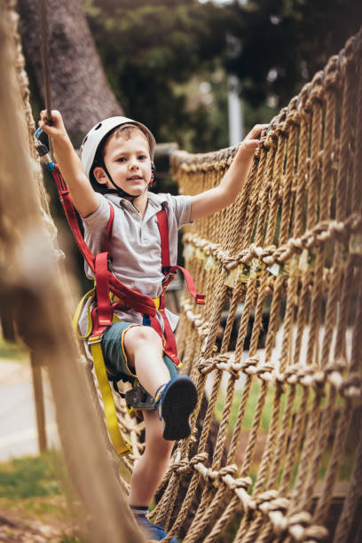 istock Brave little boy having fun at adventure park 1272655176