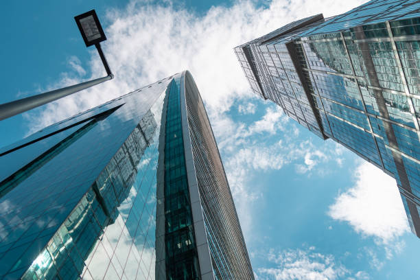 istock Skyscraper in a finance district, urban city architecture, sky cloudy background 1272663481