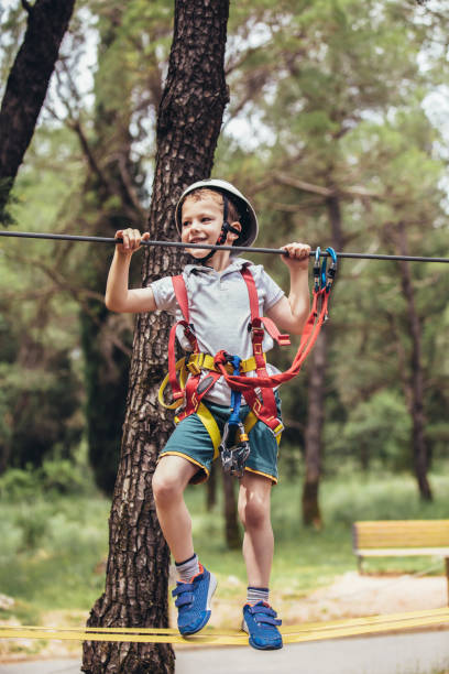 istock Brave little boy having fun at adventure park 1272666945