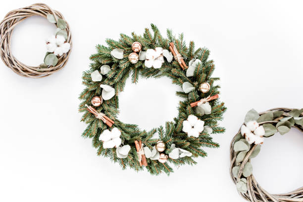 istock Wreath frame and wreath from vine and eucalyptus branch on white background. Flat lay, top view holiday decoration concept. Christmas composition 1272669223