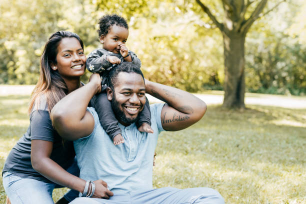 istock Authentic family enjoying time outdoor 1272669367