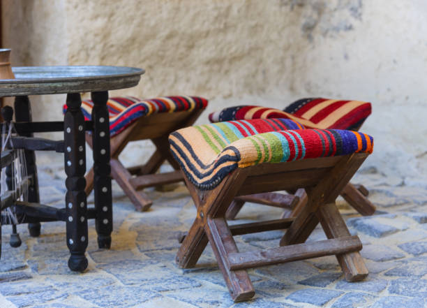 istock Turkish chairs and table outdoor with stoned wall at background 1272671606