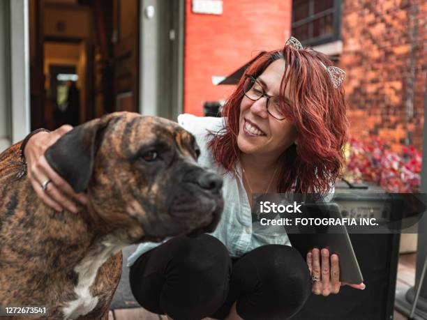 Woman With The Dog Stock Photo - Download Image Now - One Woman Only, Women, 50-54 Years