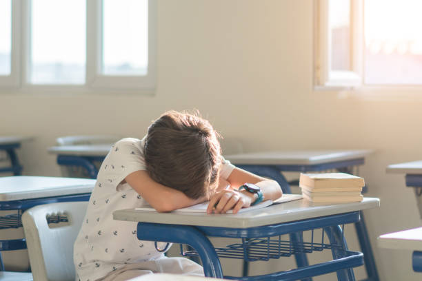 istock He's had a long day at school. 1272674515