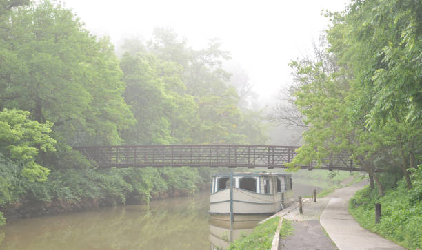 Canal boat in the fog-on the Erie Canal-Near Watertown Ohio Canal boat in the fog-on the Erie Canal-Near Watertown Ohio erie canal stock pictures, royalty-free photos & images