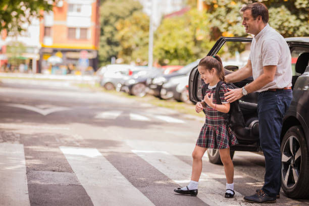 istock Father taking his daughter to school 1272681470